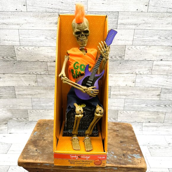 Brand NIB Spooky Village Animated Skeleton w/Instrument Plays Guitar - Picture 1 of 6